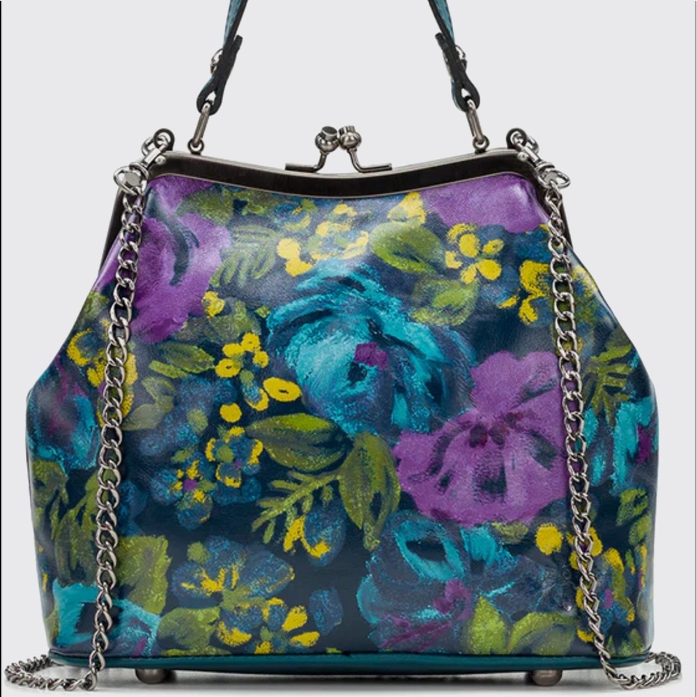 Compact and charming, the Laureana Frane Satchel. In Deep Blue Nature leather.